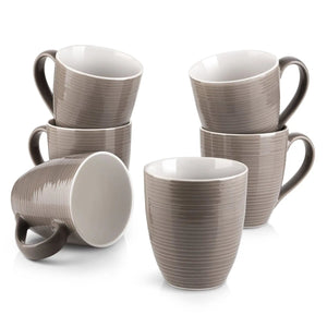 Set of six gray coffee mugs with ribbed texture on a white background