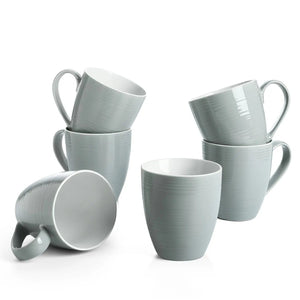 Set of light gray mugs on a white background