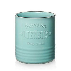 Teal ceramic utensil holder with 'Premium Utensils Vintage Forever' text on a white background