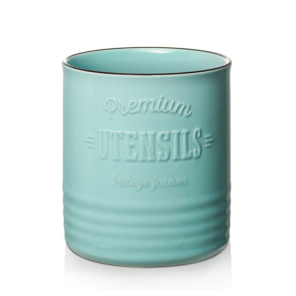 Teal ceramic utensil holder with 'Premium Utensils Vintage Forever' text on a white background