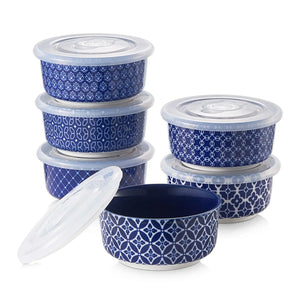Set of blue ramekins with lids on a white background
