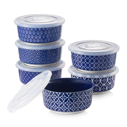 Set of blue ramekins with lids on a white background